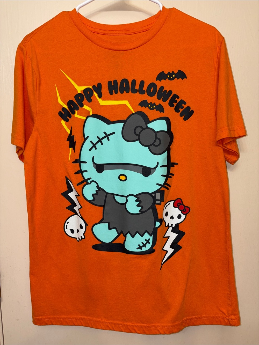 Hello Kitty Orange Tee with Turquoise Zombie Graphic
